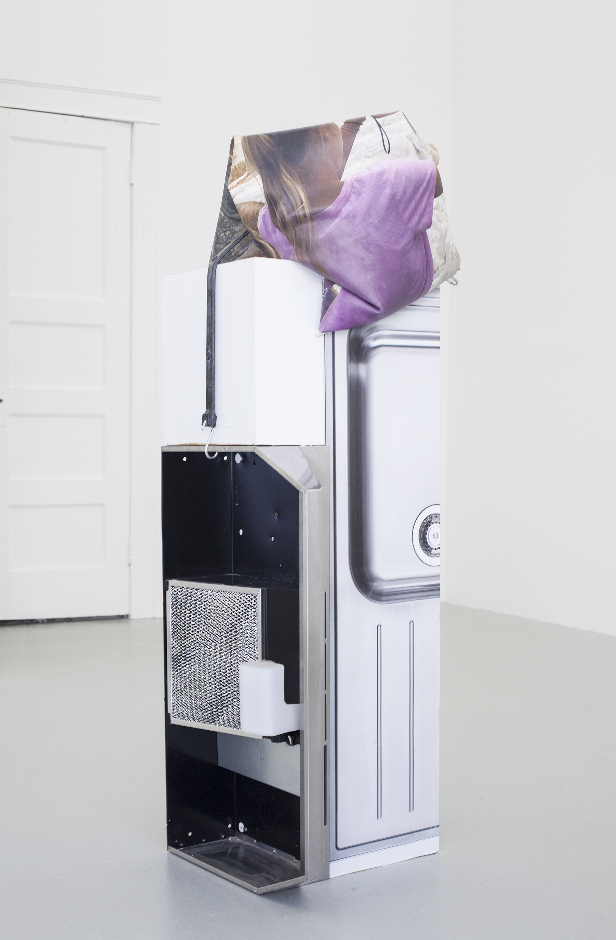 Ashley Carter Too Folds, 2015 Oven hood, vehicle wrap, plaster, digital print on silicone, and wood
