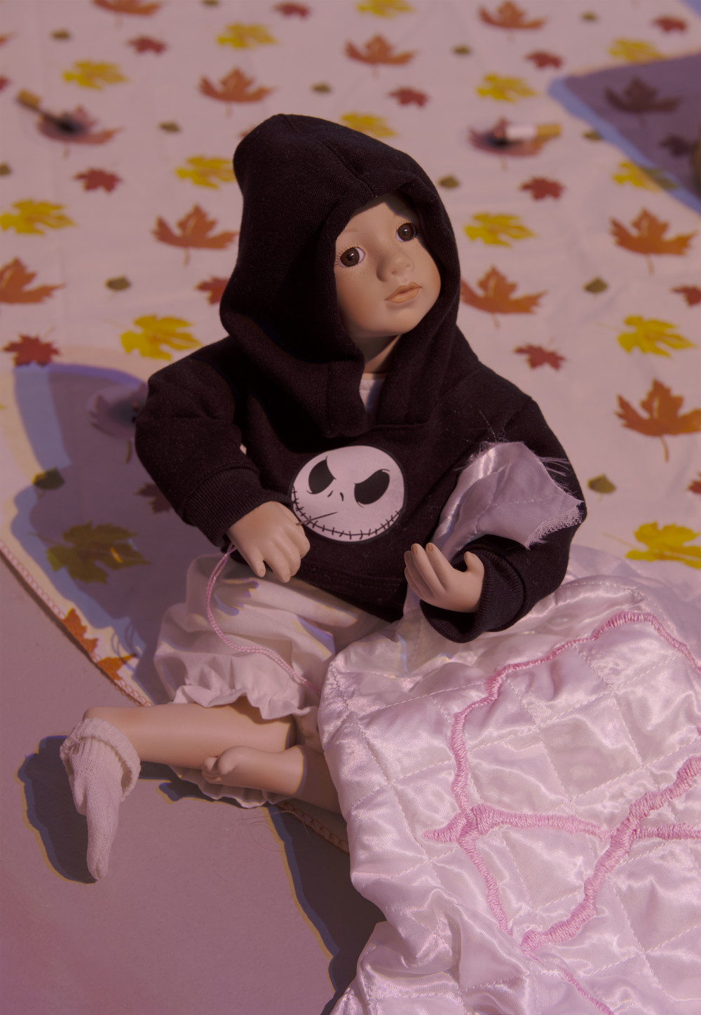 Flannery Silva Chloé Doll (Detail), 2015 Amish Blessings "Ruth" Doll, custom Jack Skelly sweatshirt, bloomers, sock, needle, hand embroidered anarchy heart quilt, fake cigarette burn
