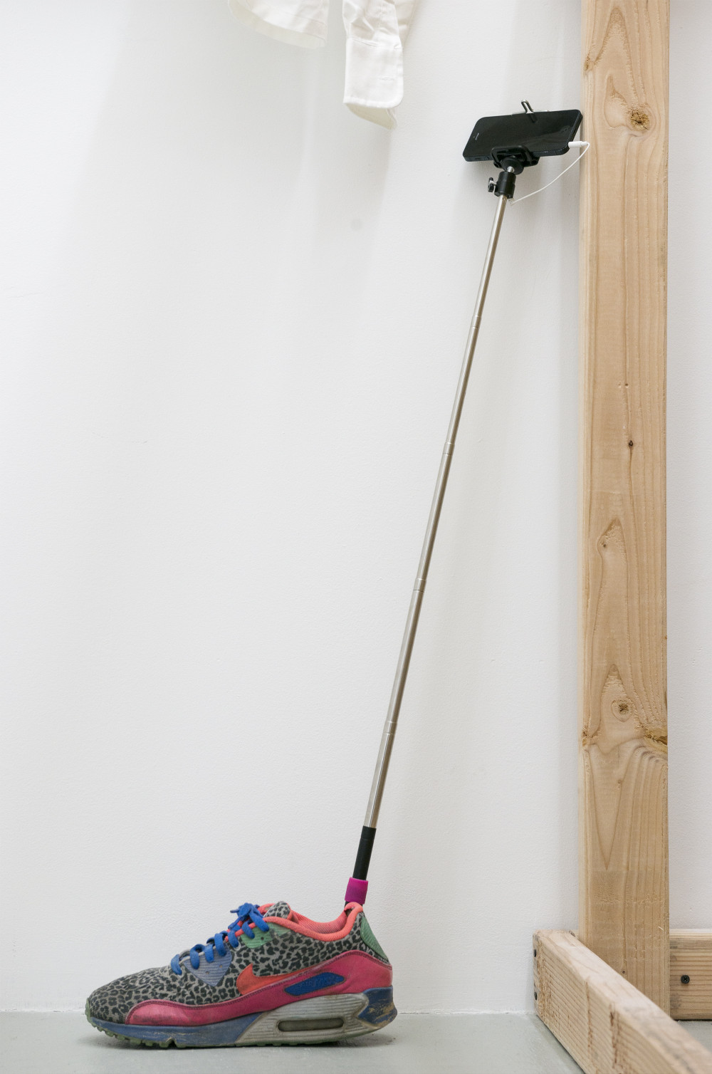 Yefu Liu Floating point (Detail), 2015 Single channel HD video, 9m24s, running shoe, selfie stick, iPhone 